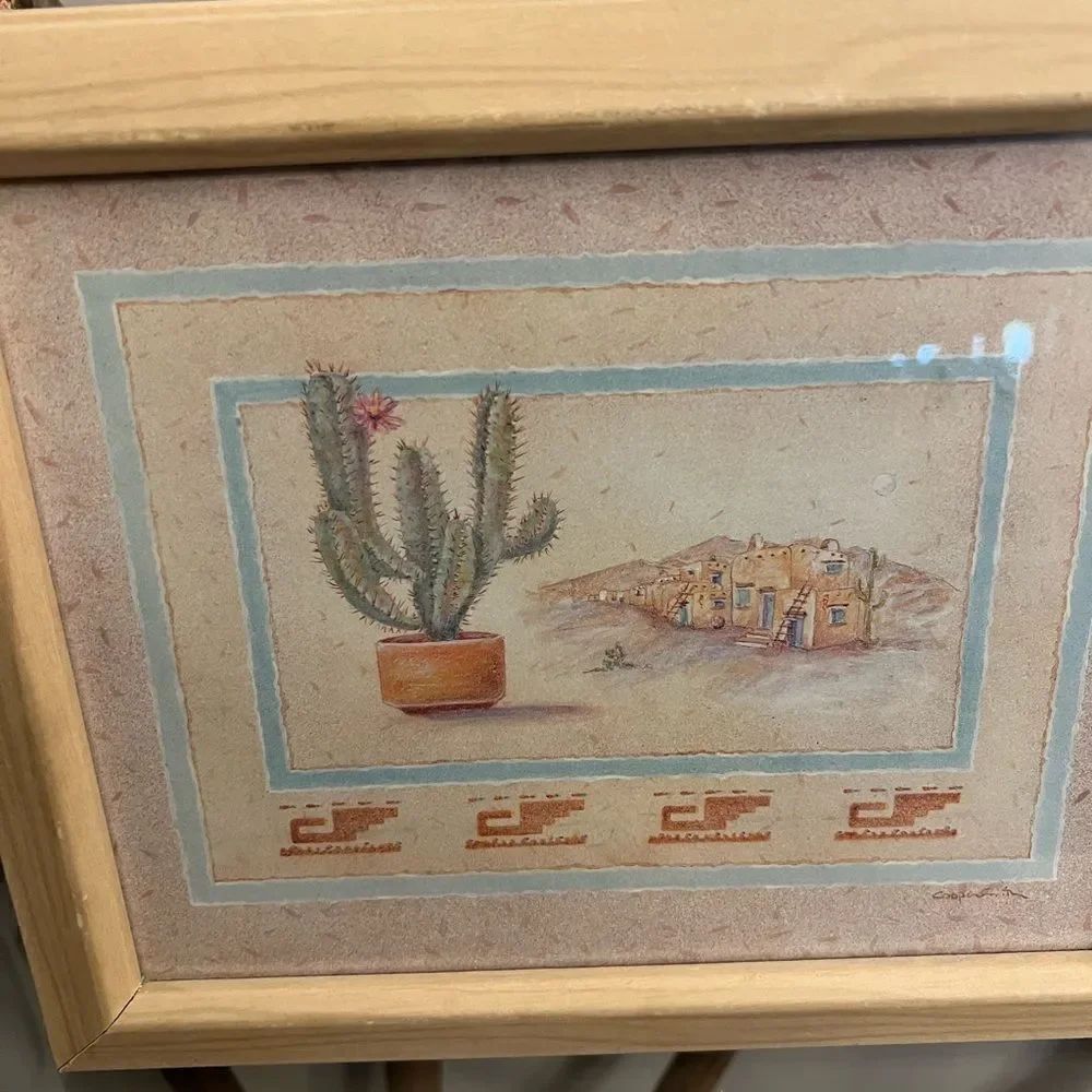 Two framed Southwest Aztec western pictures.